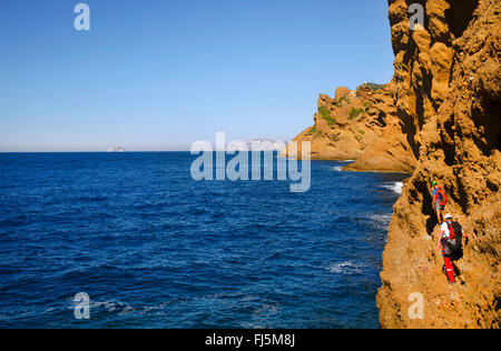 climbers at coastal rock Bec de l'Aigle, France, Provence, Calanques National Park, La Ciotat Stock Photo