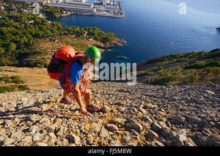 climber at coastal rock Bec de l'Aigle, France, Provence, Calanques National Park, La Ciotat Stock Photo