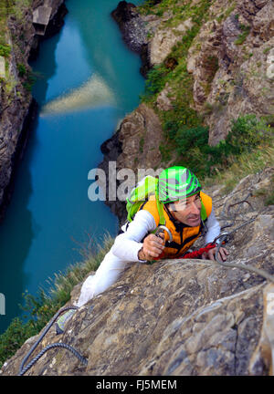 climber on via ferrata over the lake of Sautet, France, Corps Stock Photo