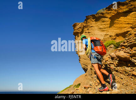 climber on the way to coastal rock Bec de l'Aigle, France, Provence, Calanques National Park, La Ciotat Stock Photo