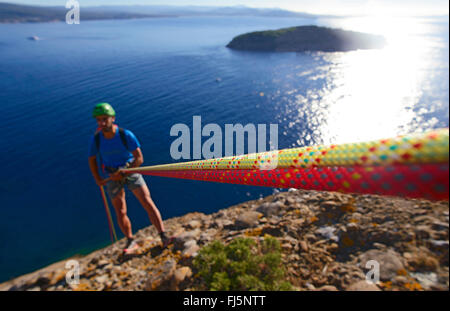 climber at coastal rock Bec de l'Aigle, France, Provence, Calanques National Park, La Ciotat Stock Photo