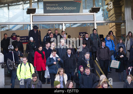 London Commuters heading into City of London after arriving at Waterloo Station, one of the main transport links to the Capital Stock Photo