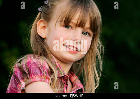 little girl smiling, portrait, Germany Stock Photo