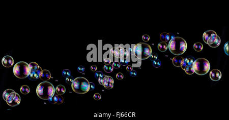 colorful soap bubble wave on black background Stock Photo