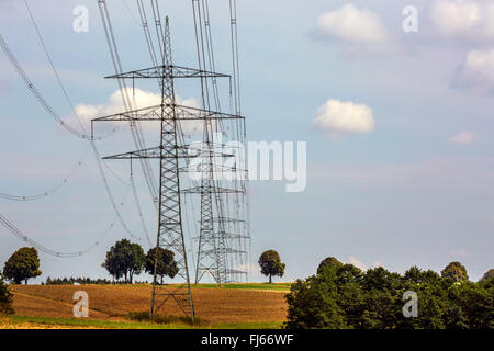 high-tension lines in field landscape, Germany, Bavaria, Oberbayern, Upper Bavaria Stock Photo