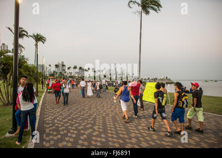 PANAMA CITY, Panama — People enjoying an evening stroll on the  waterfront boardwalk in Casco Viejo in Panama City, Panama. Stock Photo