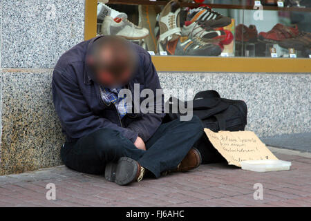 homeless man in town, Germany Stock Photo