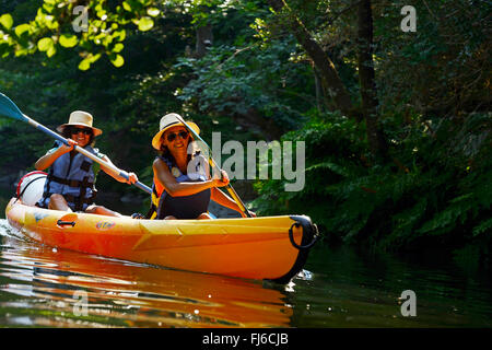 two women canoeing on the river Golo, France, Corsica, Bastia Stock Photo