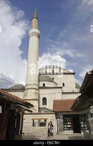 Sarajevo, Gazi Husrev-beg mosque, minaret and dome, dark cloud, evening light, Bosnia and Herzegovina Stock Photo