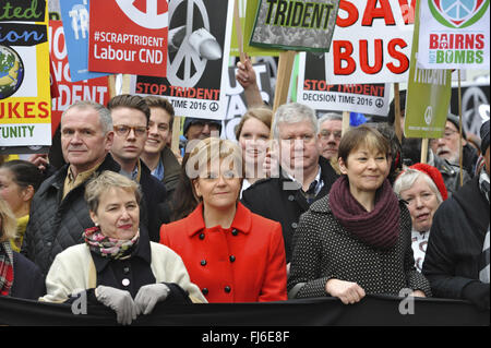 Kate Hudson (General Secretary, Campaign for Nuclear Disarmament), Nicola Sturgeon MSP (First Minister of Scotland) and Caroline Lucas MP (Green Party) at the head of the Stop Trident demonstration. Stock Photo