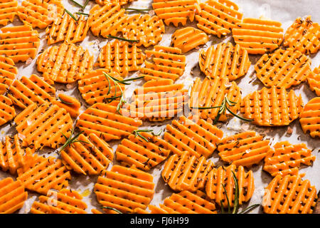 sweet potato chips homemade, lattice pattern, spices, stove, itself, cook, cooking, grease, oil, ribbing, taste, intensely sweet Stock Photo