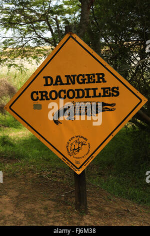 Crocodile warning signs at Saint Lucia, isimangaliso wetlands reserve,  KwaZulu-Natal, South Africa. Stock Photo