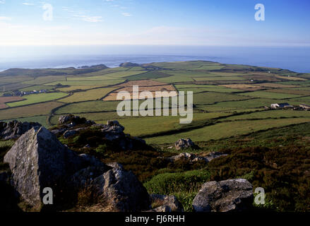 View from Garn Fawr hillfort over fields towards Strumble Head on North Pembrokeshire coast summer evening sunset Wales UK Stock Photo