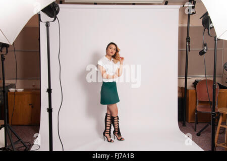 Young British Asian girl in studio setting, London, England, United Kingdom Stock Photo