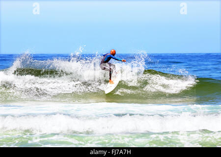 VALE FIGUEIRAS - AUGUST 20: Professional surfer surfing a wave on august 20 2014 at Vale Figueiras in Portugal Stock Photo