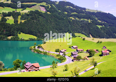 Houses with lake and mountain view in Lungern in Switzerland Stock Photo