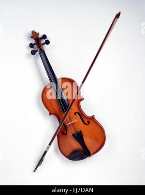 Still-life of violin with bow on white background, London, England, United Kingdom Stock Photo