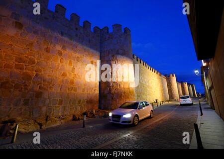 (160301) -- BRUSSELS, March 1, 2016 (Xinhua) -- Photo taken on Feb. 16, 2016 shows night view of the old town of Avila in Spain. The city of Avila is around 100 km to the north-west of Spain's capital city of Madrid. Founded in the 11th century to protect the Spanish territories from the Moors, this 'City of Saints and Stones', the old town of Avila has kept its medieval austerity. This purity of form can still be seen in the Gothic cathedral and the fortifications which, with their 82 semicircular towers and nine gates, are the most complete in Spain. The Old Town of Avila with its Extra-Muro Stock Photo