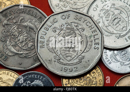 Coins of the Seychelles. Coat of arms of the Seychelles depicted in the Seychellois rupee coins. Stock Photo