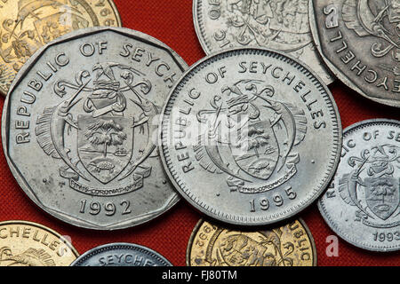 Coins of the Seychelles. Coat of arms of the Seychelles depicted in the Seychellois rupee coins. Stock Photo