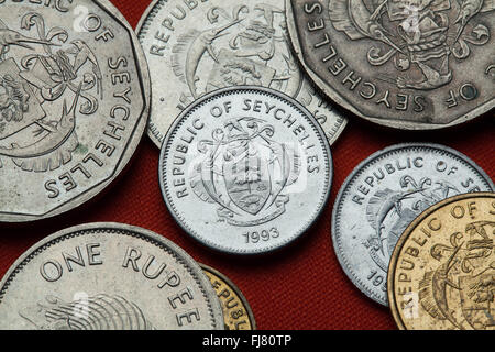 Coins of the Seychelles. Coat of arms of the Seychelles depicted in the Seychellois rupee coins. Stock Photo