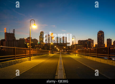 Minneapolis downtown skyline at night from Stone Arch Bridge. Minneapolis Minnesota. Stock Photo