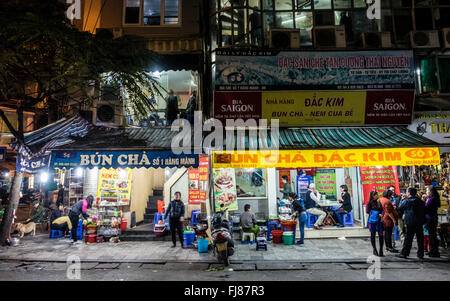 Rival Bun Cha restaurants controversially sharing the same business address on Hang Minh Street in Hanoi, Vietnam Stock Photo