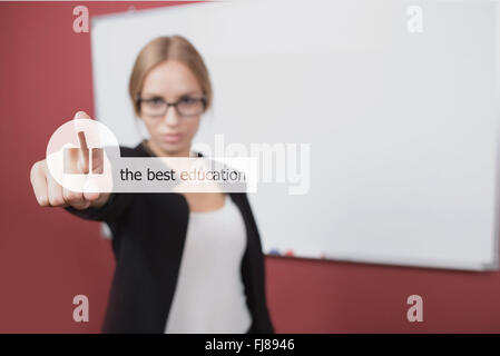 business, technology, internet concept - businesswoman pressing best education button on virtual screens Stock Photo
