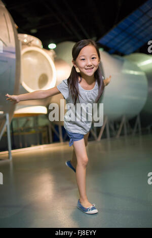 Little Chinese girl in science and technology museum Stock Photo