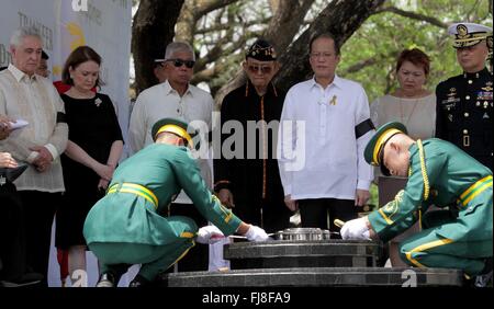 Taguig City, Philippines. 29th Feb, 2016. President Benigno S. Aquino III pay's respect as they laid to rest the urn to the gravesite during the Transfer and Reinternment of the remains of the late President Elpidio R. Quirino at the Libingan ng mga Bayani in Bayani Road. In photo are Former president Fidel Ramos, National Historical Commission of the Philippines (NHCP) chairperson Maria Serena Diokno, Defense Secretary Voltaire Gazmin, Armed Forces of the Philippines Vice Chief-of-Staff Lt. Gen. Romeo Tanalgo. © Malacañang Photo Bureau/Pacific Press /HO/Alamy Live News Stock Photo