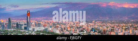 The skyline of Santiago in Chile. Photographed from Cerro San Cristobal at sunset. Stock Photo