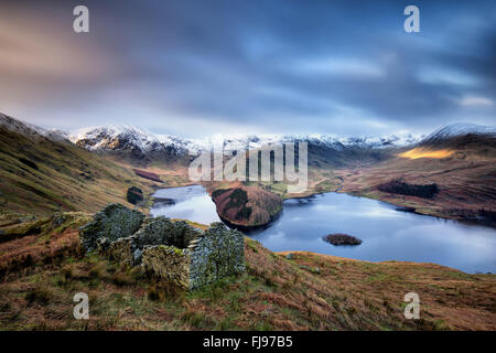 A ruined building above Haweswater Reservoir on the Old Corpse Road, English Lake District Cumbria Stock Photo