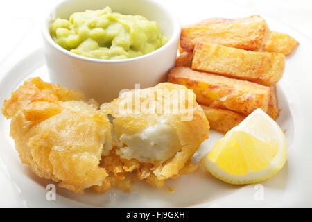 Halloumi battered with chips and mushy peas Stock Photo