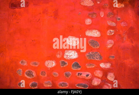 red grunge wall, highly detailed textured background Stock Photo