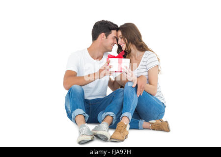 Happy couple receiving a gift Stock Photo