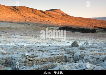 Winter sun on Whernside, one of the Yorkshire Dales three peaks Stock Photo
