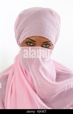 Beautiful  black african muslim woman wearing pink headscarf Stock Photo