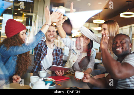 Group of young friends enjoying spending time together Stock Photo