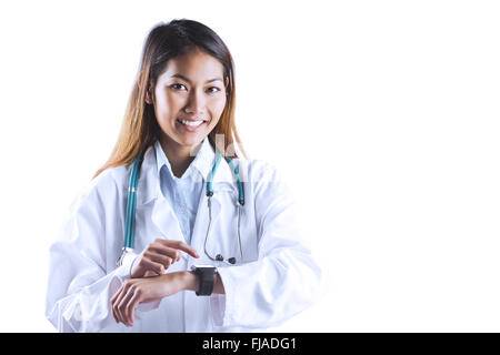 Asian doctor using her smart watch Stock Photo