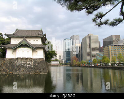 Guard tower of the Imperial Palace, and Tokyo skyline. Stock Photo