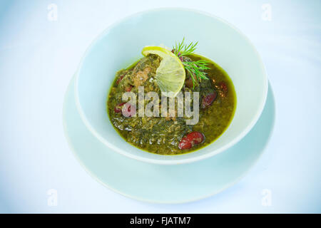 Iranian food: Ghormeh Sabzi herb and meat stew Stock Photo
