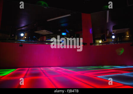Red illuminated disco dance floor Stock Photo