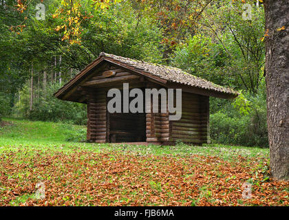 Wooden hut in the forest Stock Photo