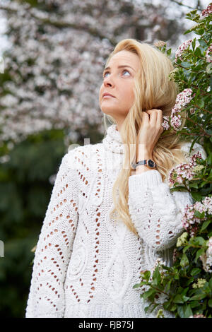 Woman walking outdoors Stock Photo