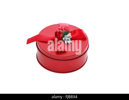 Round red gift box on white background. Isolated with clipping path Stock Photo
