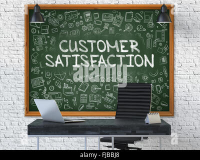 Chalkboard on the Office Wall with Customer Satisfaction Concept. Stock Photo