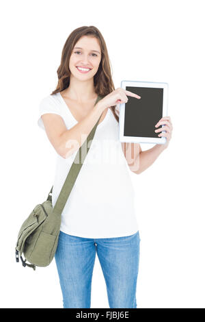 Portrait of happy female college student showing digital tablet Stock Photo