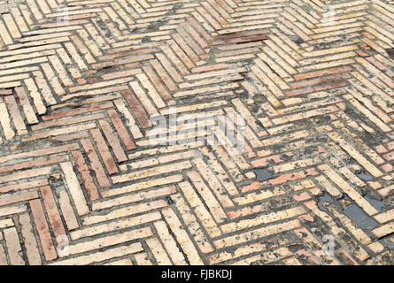 weathered  fish bone tiled stone floor Stock Photo