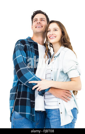 Couple standing and looking away Stock Photo