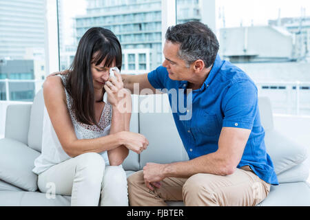 Therapist consoling a woman Stock Photo